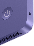 iMac, parte posterior, color morado, se muestran el botón de encendido, la entrada para audífonos y la rejilla de la bocina