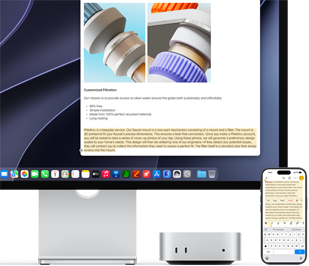Parte frontal de una Mac mini, ubicada debajo de un monitor Studio Display, hay un iPhone a la derecha del dispositivo y la pantalla, con texto seleccionado y comandos de cortar, copiar, pegar y Autorrelleno en la parte superior que corresponden al texto resaltado en pantalla, que muestra el Portapapeles Universal